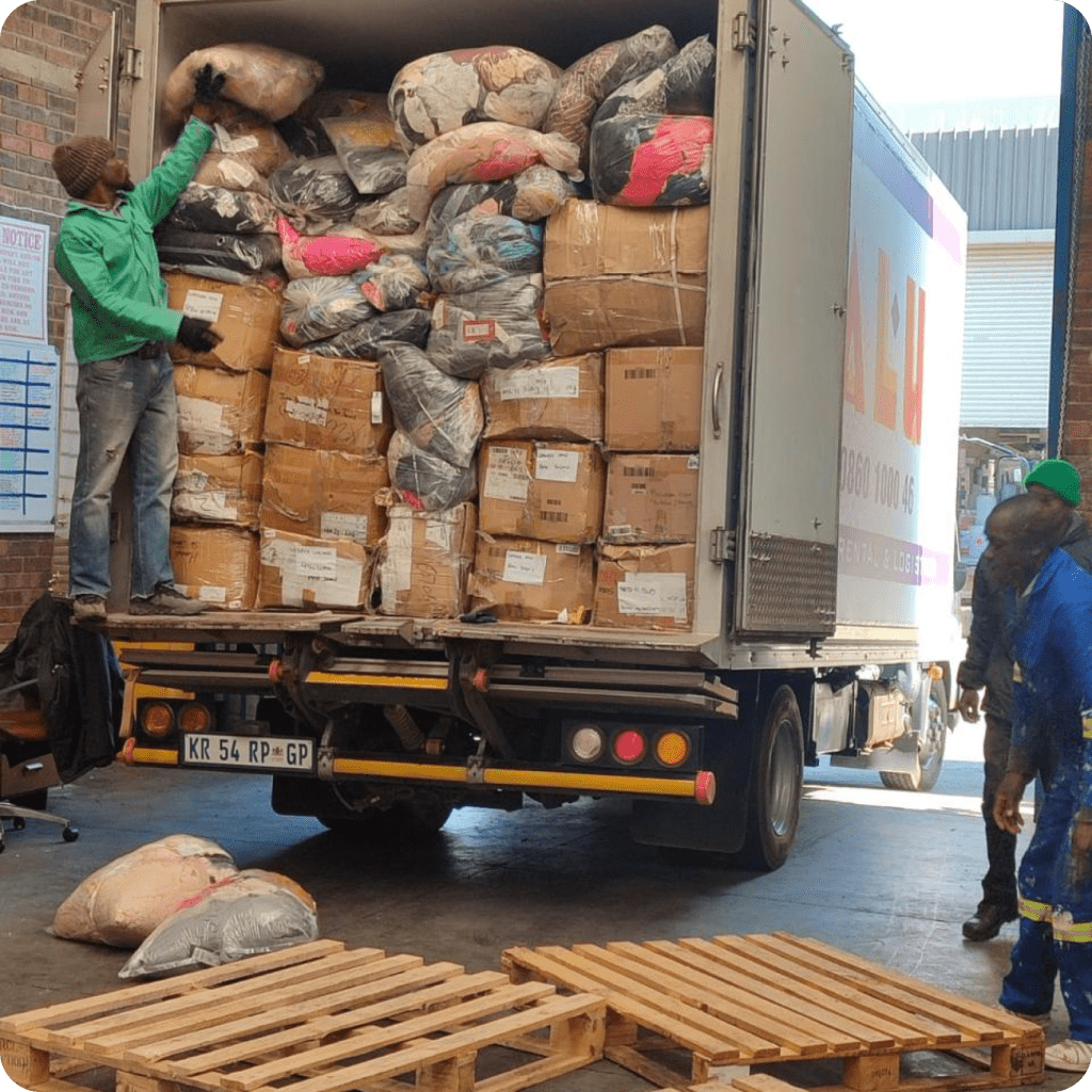 Offloading Bulk Buy Clothing Bales from truck